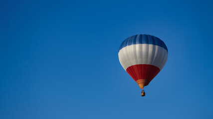 Hot air balloon in the blue sky