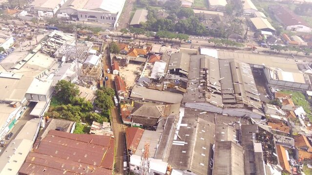 Aerial Footage. Video of the impact of the natural disaster of a typhoon that hit the Rancakek area and the Sumedang border on February 21 2024, Indonesia. Shot from a drone flying in 4k 30fps.