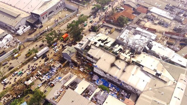Aerial Footage. Damage to roofs and buildings in the Dwipapuri and Kahatex industrial areas due to tornadoes at Rancakek and the Sumedang border on 21/February/2024, Indonesia. Shot in 4k 30fps