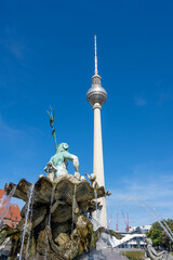 The TV Tower and part of the Neptune Fountain on Alexanderplatz in Berlin - 742248845