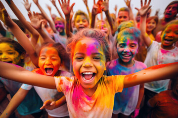 Group of happy color painted kids in color run event, cheerful expressions
