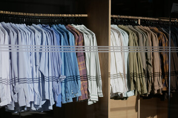 Formal wear fashion store, Men ,striped shirt on hanger. 
