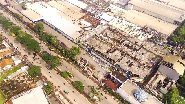 Aerial Footage. Damage to roofs and buildings in the Dwipapuri and Kahatex industrial areas due to tornadoes at Rancakek and the Sumedang border on 21/February/2024, Indonesia. Shot in 4k 30fps