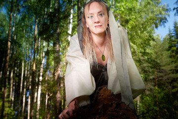Beautiful seductive dryad. Pagan spirit of the forest. Portrait of beautiful dryad. Fairy who loves...