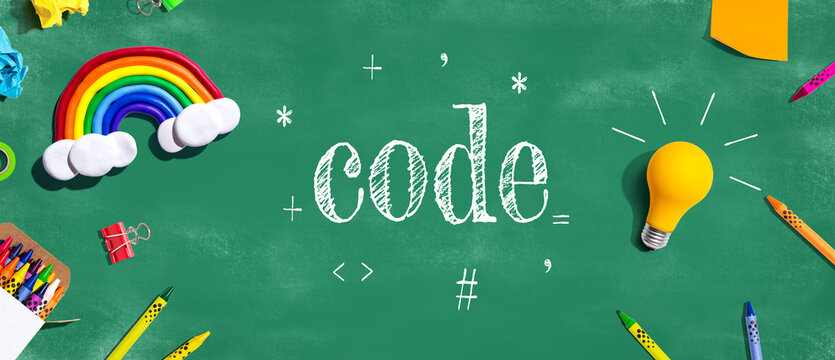 Learn to Code theme with school supplies - flat lay
