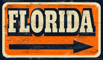 Retro distressed Florida sign on wood 