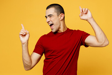 Young smiling happy cheerful cool middle eastern man he wearing red t-shirt casual clothes raise up...