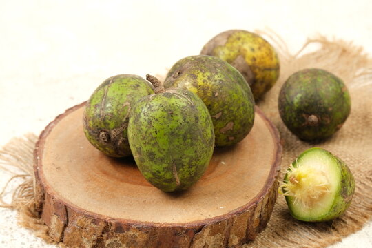 Kedondong or ambarella fruit or otaheite apple or great hot plum fruit on table top