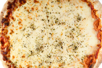 Baked pizza with cheese and spices