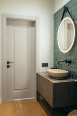Modern green bathroom in house