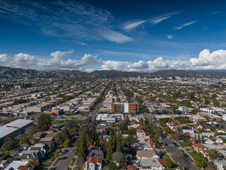 Aerial view of city of Los Angeles cityscape with beautiful clouds rolling over Hollywood Hills. - 742370628
