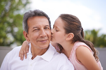 Outdoor, portrait and girl kiss grandpa on summer, holiday or vacation together in retirement with love. Senior, man and grandparent relax with child in backyard, garden or hug in Mexico with care