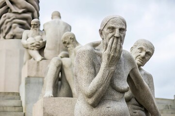 Fototapeta na wymiar Statues of old people in Vigeland park in Oslo, Norway