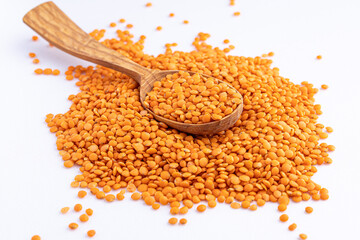 Red lentils pile isolated.Pile lentil isolated on white background.