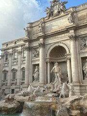 Fototapeta na wymiar Majestic Trevi fountain in Rome street view