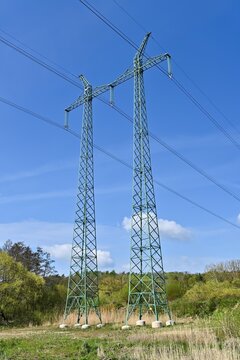 Landscape with pylons of 400 kV power transmission lines of the Czech electric transmission system.