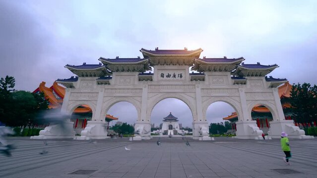 People jogging in front of the courtyard Main Gate of National Chiang Kai-shek Memorial Hall