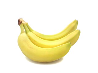 Photo of a group of ripe bananas, isolated on a white background.