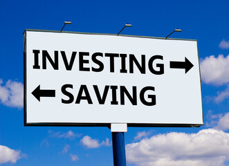 Saving or investing symbol. Concept word Saving or Investing on beautiful billboard with two arrows. Beautiful blue sky with clouds background. Business and saving or investing concept. Copy space.