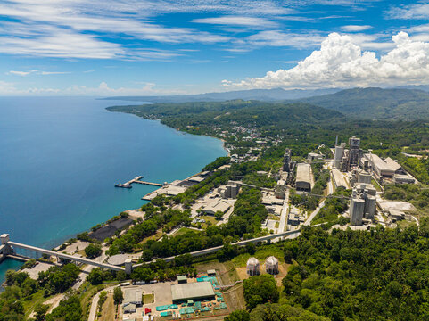 Seafront with Cement factory in Lugait, Misamis Oriental. Mindanao, Philippines.