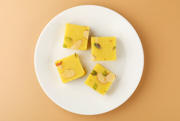 Badam Barfi or almond sweet, a popular sweet all over India made or bought during festivals or celebrations