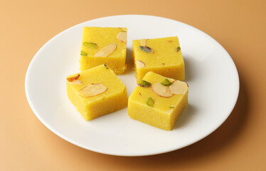 Badam Barfi or almond sweet, a popular sweet all over India made or bought during festivals or celebrations