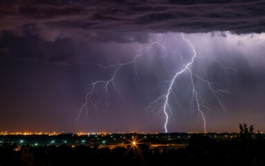 Naklejka na ściany i meble Lightning thunderstorm flash over the night sky. Hurricane, typhoon, tornado, storm.