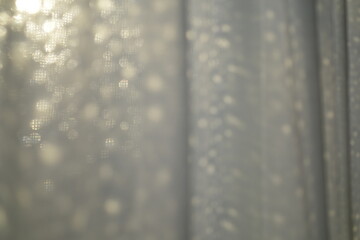 Morning light through a curtain