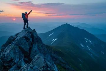 Zelfklevend Fotobehang Hiker reaching the top of mountain with raised hands and a brilliant magic hour sunset background, success concept, team work concept © Yuki Liu