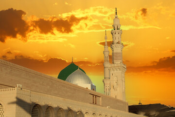 A mosque with a green dome . Masjid nabi of Medina. Green dome. - obrazy, fototapety, plakaty