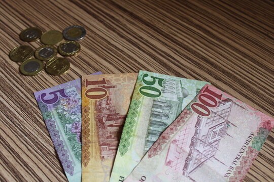 saudi arabian rial banknotes. The paper currency of saudi arabia. For tax and hike news. raise, tax, minimum wage