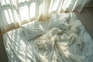 An overhead photo of a cozy bed bathed in soft sunlight filtering through sheer curtains, tempting one to indulge in a midday nap, minimalistic style,