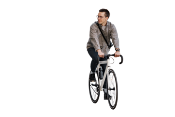 A man riding his bicycle as a means of eco-friendly transportation in the city.
