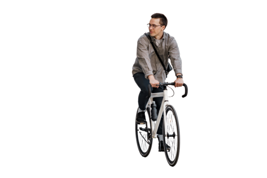 A man riding his bicycle as a means of eco-friendly transportation in the city.

