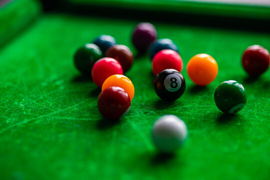 Close-up of snooker balls on a green snooker table