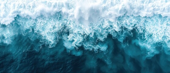a large body of water with a wave coming in from the top and bottom of the wave to the bottom of the water. - obrazy, fototapety, plakaty