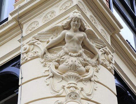 Amsterdam Spui Building Sculpted Detail Depicting a Naked Woman with Wings, Netherlands