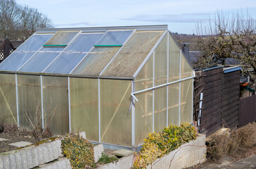 greenhouse in the spring garden