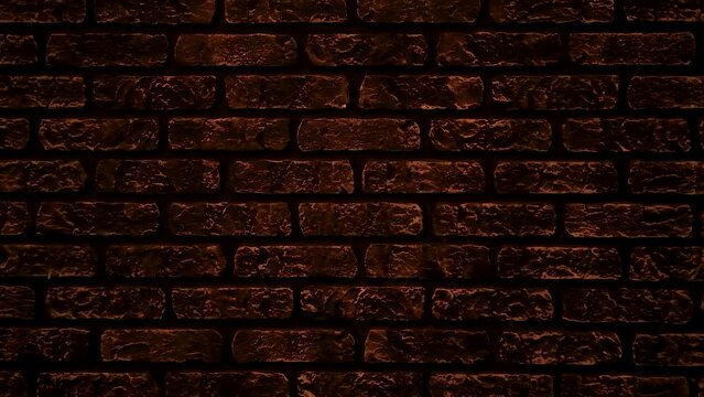 Close-up of a designer wall in the form of an ancient brick, dimly lit wall.
