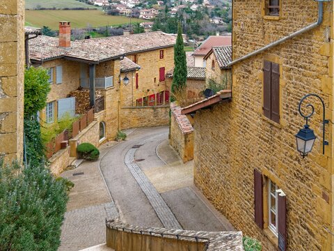 View of "Montee de l'Eglise" (church way) in picturesque medieval village of  La Tour d'Oingt, Beaujolais, France