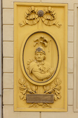 Relief on fasade of former post office (altes posthaus) near to market square, Melk, Austria