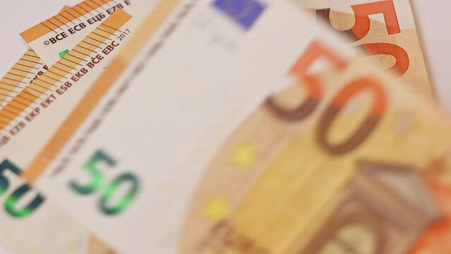 Counting money, fifty euro banknotes. Counting 50 EU banknotes.