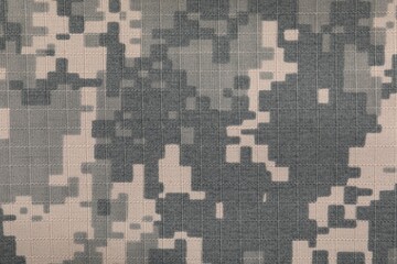 Texture of camouflage fabric as background, top view