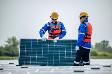 Engineers inspect the structural stability and alignment of floating solar panel arrays as QC work.