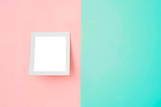 Empty instant photo frame on pastel background