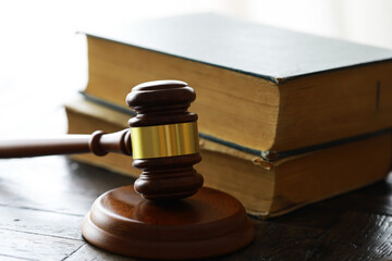 Judges gavel on wooden desk. Law firm concept.