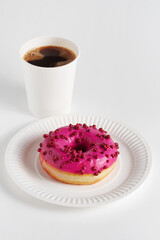 Pink donut and coffee