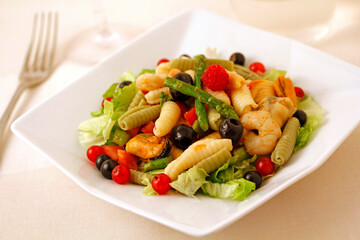 Salad with seafood, veggies and fruit.