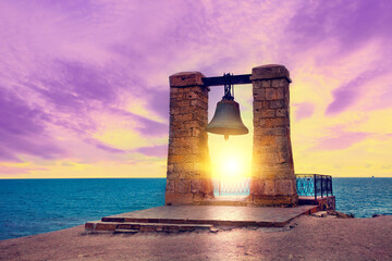 Old bell at sunset in the ancient city of Chersonesus, Sevastopol, Crimea