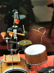 Fototapeta premium a doll playing musical instrument